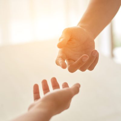 Hands of couple Male and female hands outstretched in direction to each other
